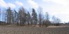 Pieni metsäalue peltojen keskellä.. Kuvaaja: V.-P. Suhonen, Museovirasto.