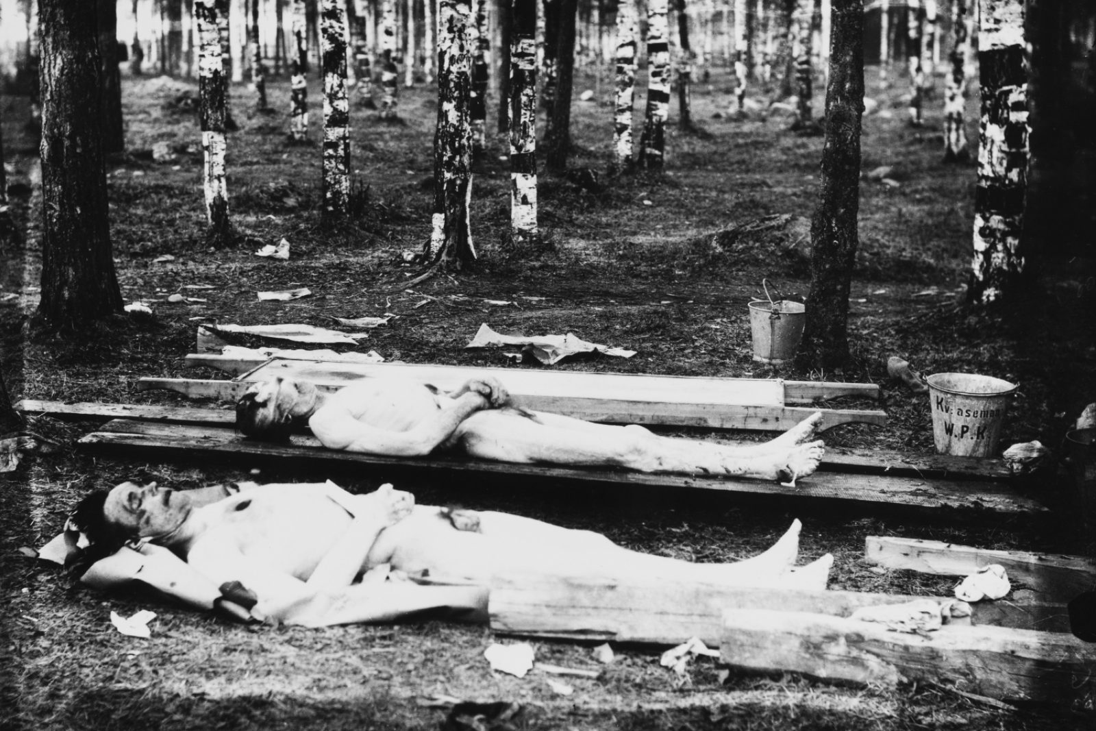 Victims of political terror raised from a field of blood in Tommola and from the Kymijoki in May 1918. Photo: Leonard Karlsson / Picture Collections of the Finnish Heritage Agency. Objektinumero: HK19720912:1 Victims of political terror raised from a field of blood in Tommola and from the Kymijoki in May 1918. Photo: Leonard Karlsson / Picture Collections of the Finnish Heritage Agency. Objektinumero: HK19720912:1