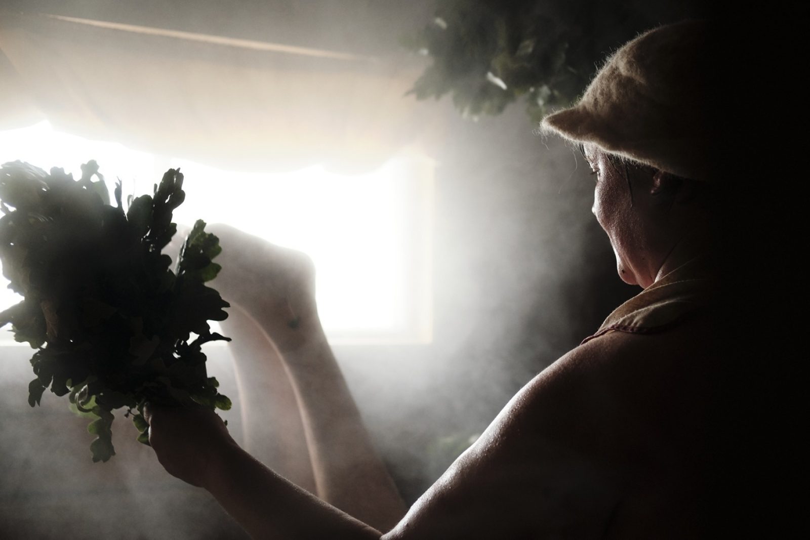 Traditional Finnish sauna whisking and loyly Ville Kurki